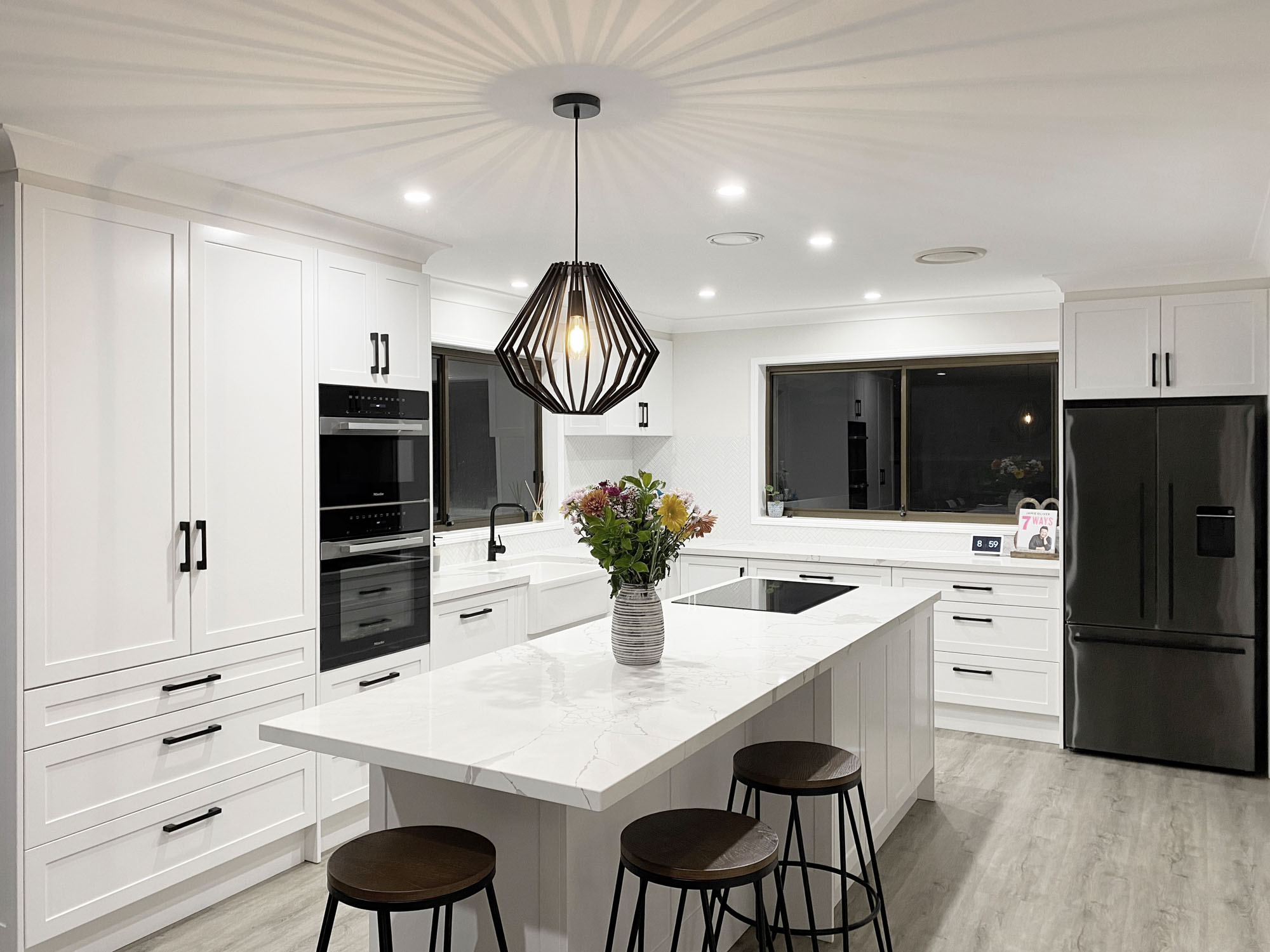 Full White and Black Kitchen with Pendant Lighting